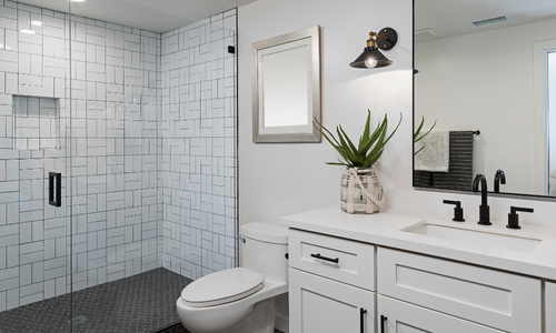 simple bathroom renovated with black and white theme
