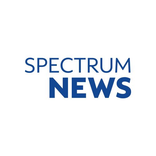 Spectrum News logo in blue on a white background