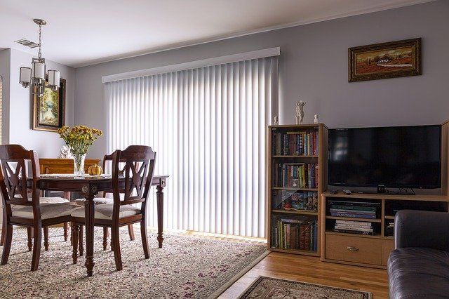 home interior with white vertical blinds
