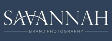 A logo for savannah brand photography on a blue background