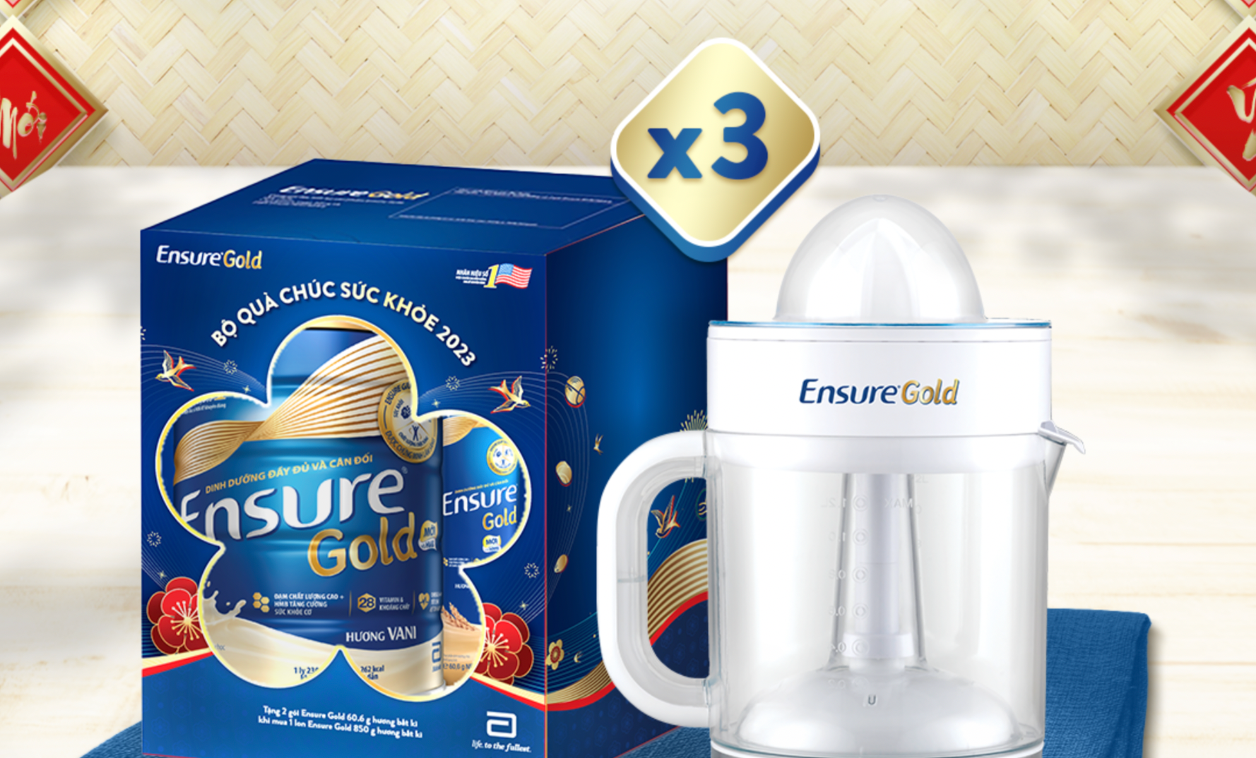 Ensure Gold nutritional drink box and an electric citrus juicer with