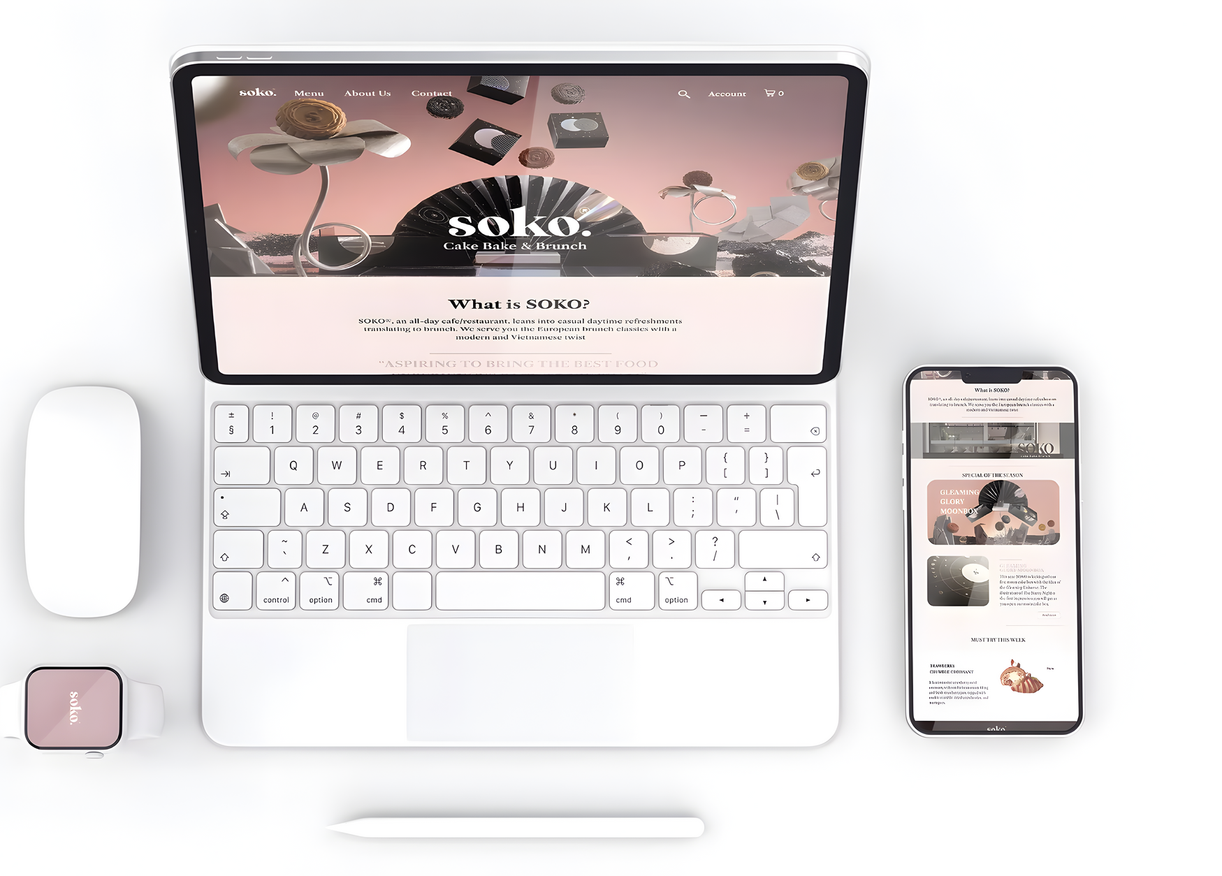 Laptop, phone, and accessories displaying the Soko website.