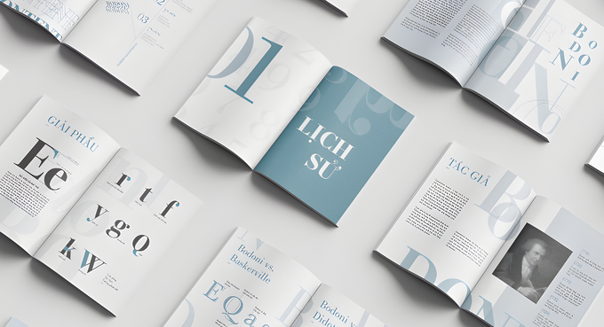 Open books with light blue and white pages, scattered on a white surface, showcasing typography and text in Vietnamese.