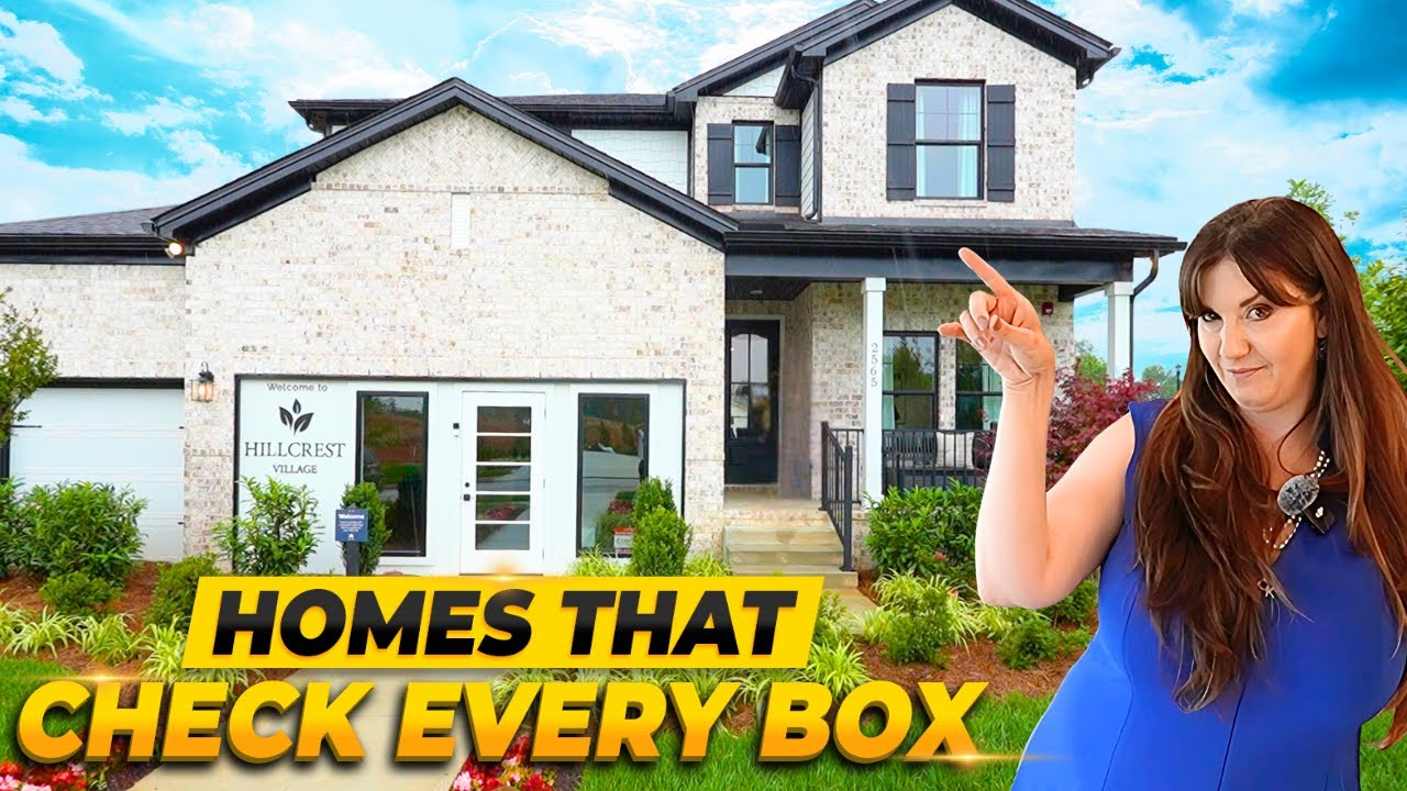 Woman standing by a modern house with yellow text reading “HOMES THAT CHECK EVERY BOX”