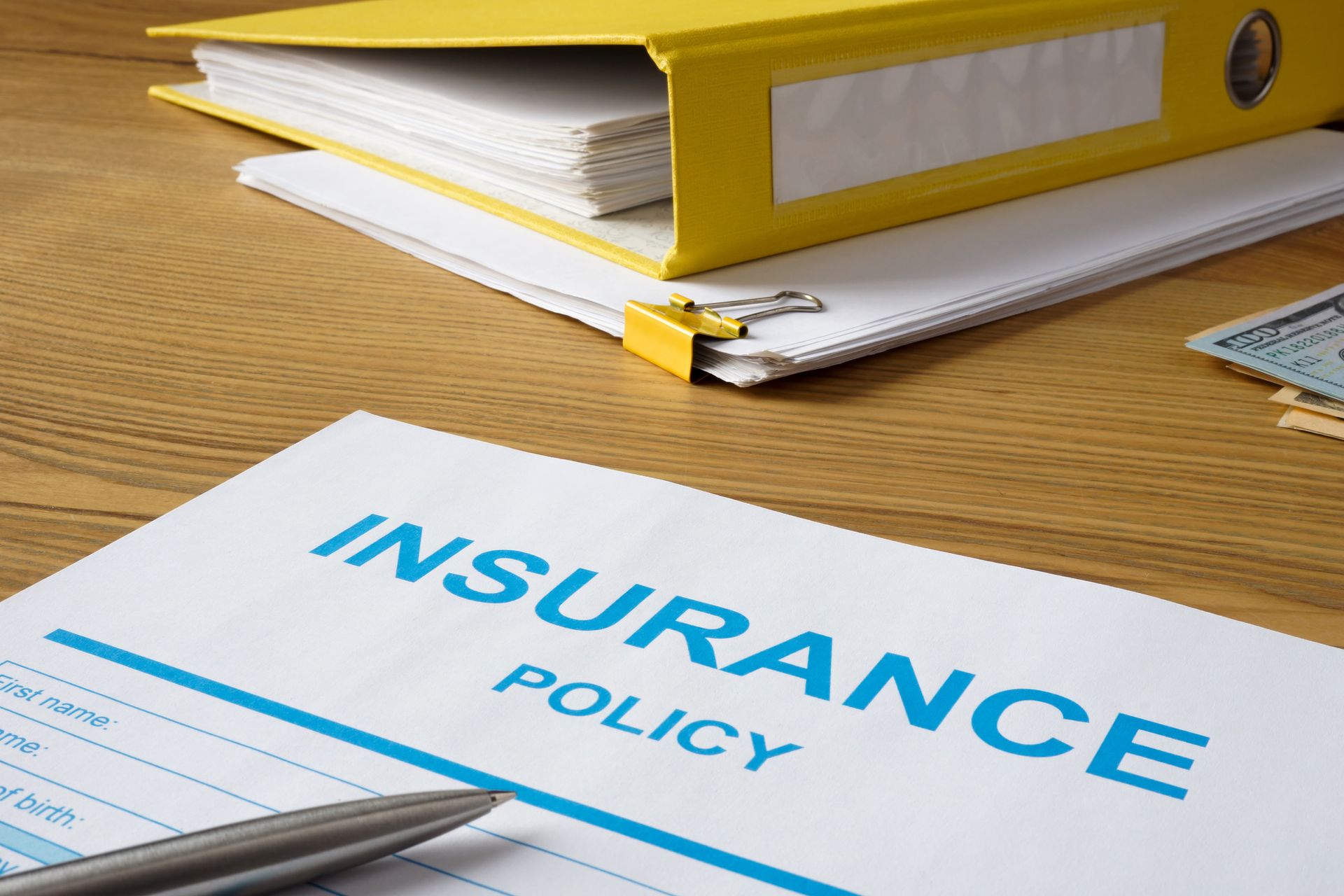 Close-up of an insurance policy form ready to be filled out.