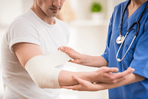 nurse treating a man