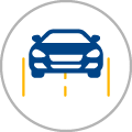 A blue car is parked on the side of the road.
