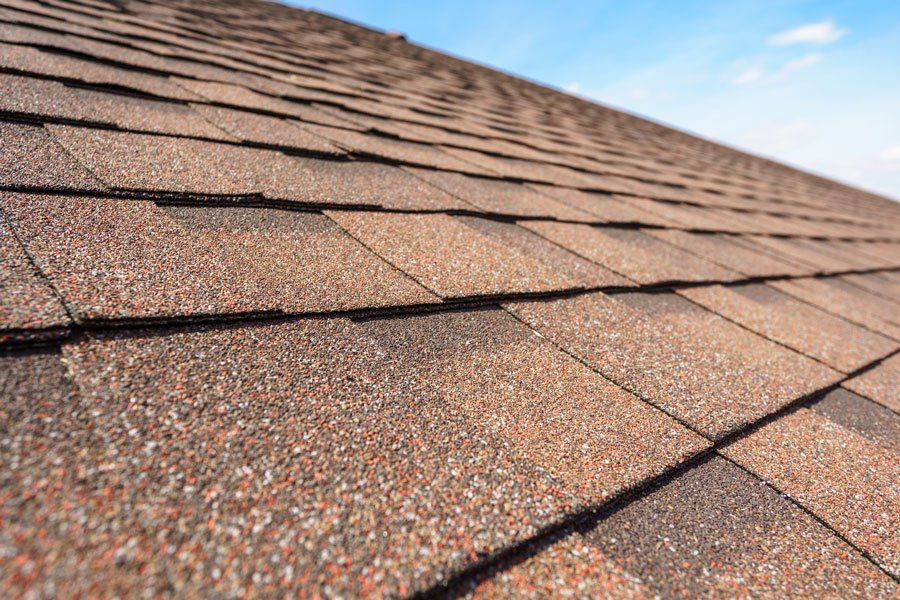 Close-up Photo of Asphalt Shingles Layer on top of Roof — Dayton OH — Gem City Home Improvements