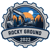 An emblem shows a grey excavator against a forest sunset. Text reads "ROCKY GROUND" and "2022" inside a gear-shaped border.