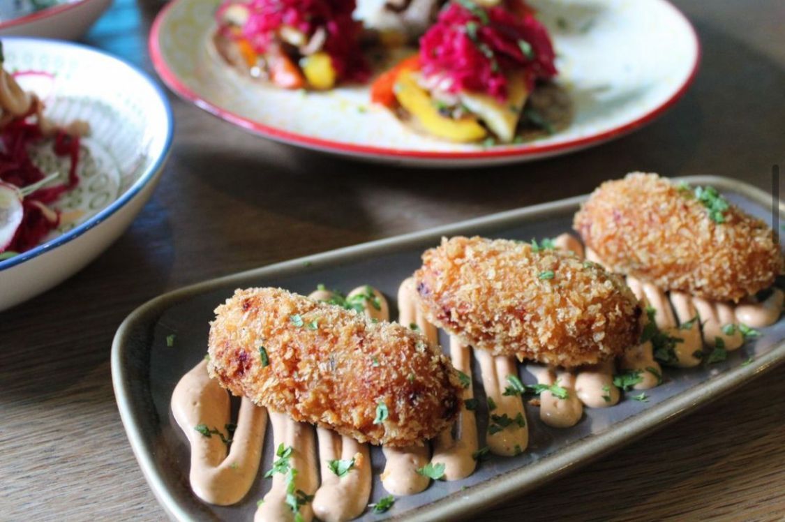 A close up of a plate of food on a table.
