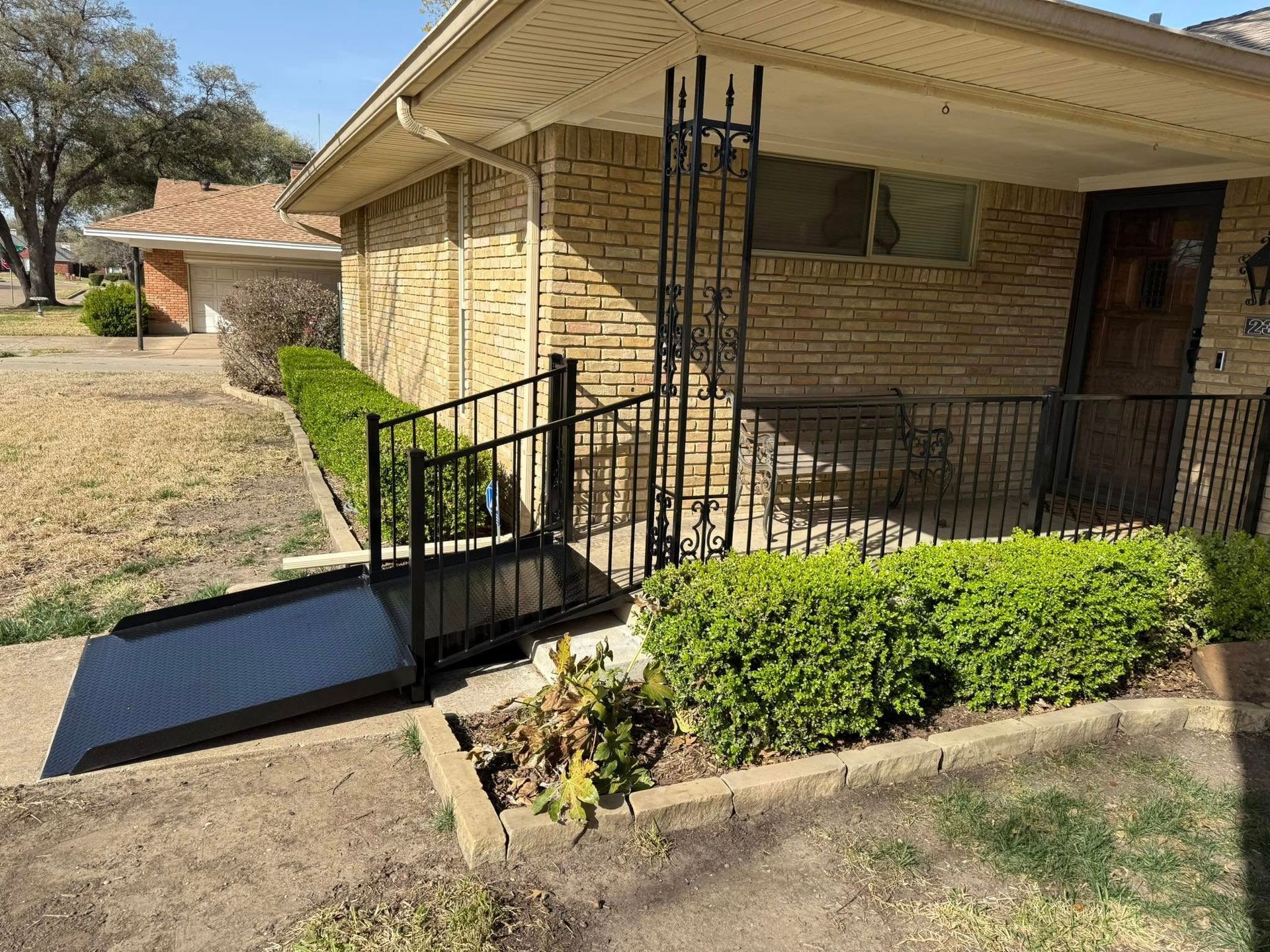 A house with a ramp in front of it.