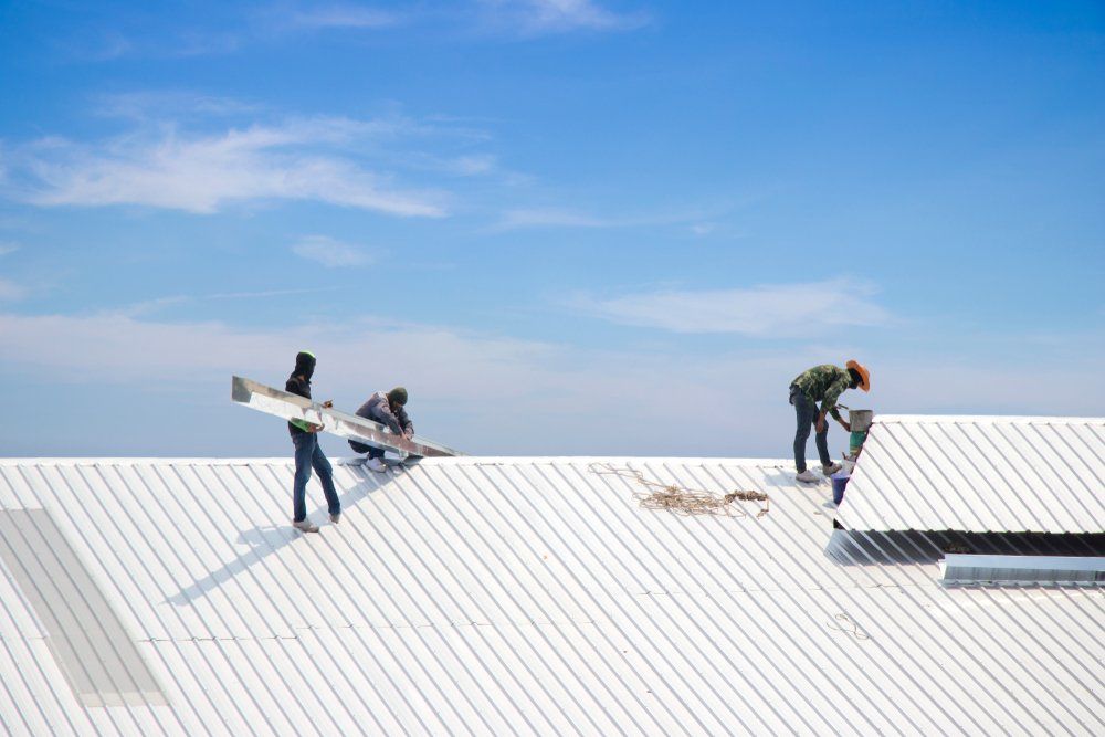 Workers Working On Roof — Roofing in Goulburn, NSW