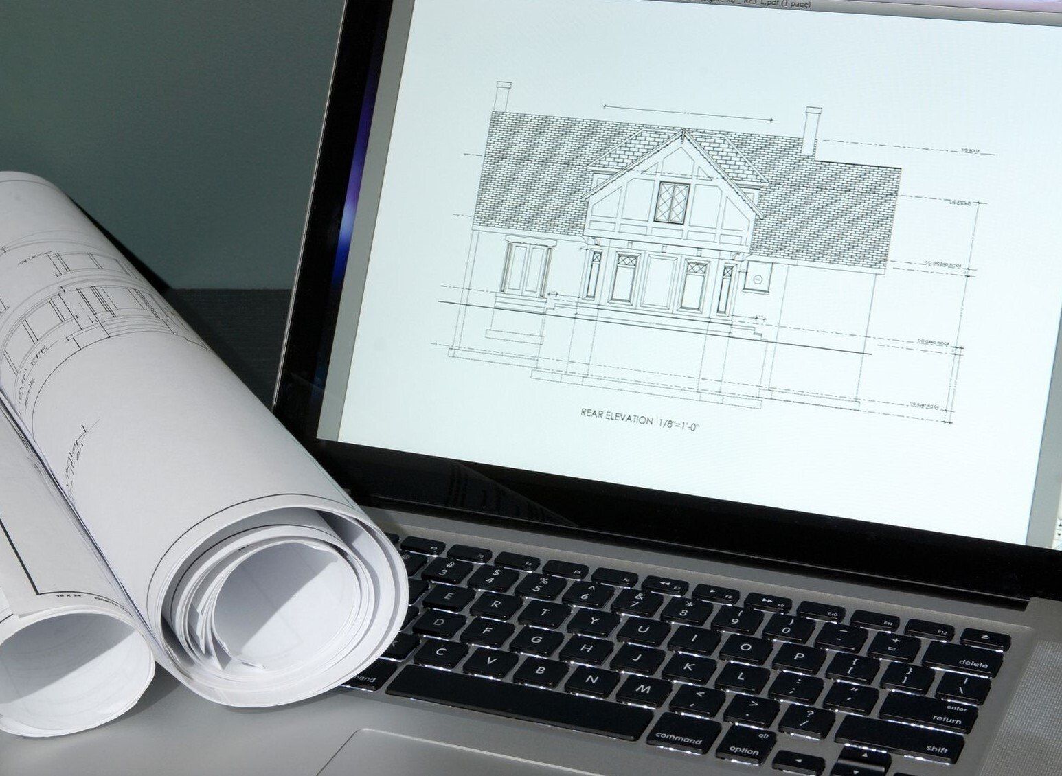 house elevation drawing on laptop screen