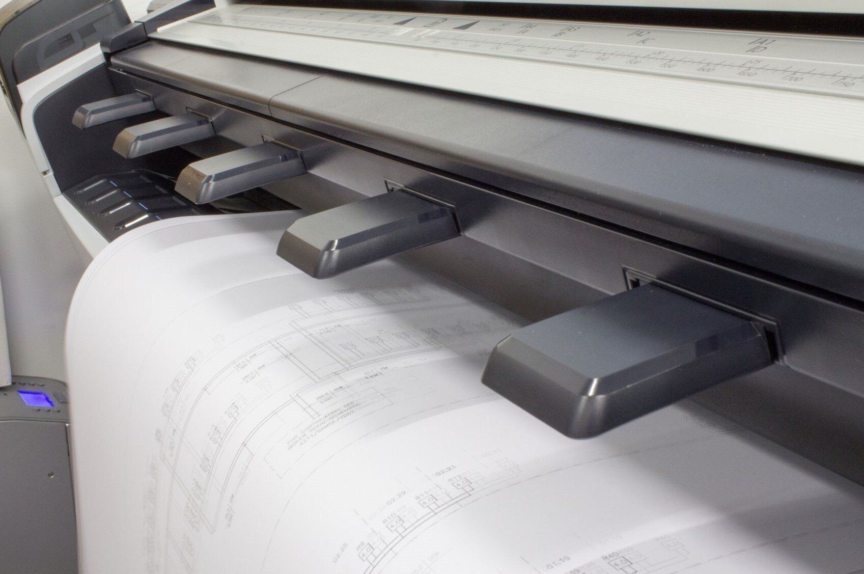 Plotter printing out large architectural drawings