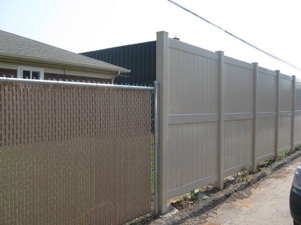 Chain Link Fence with Vinyl Privacy Slats and 8 Tall Cheste