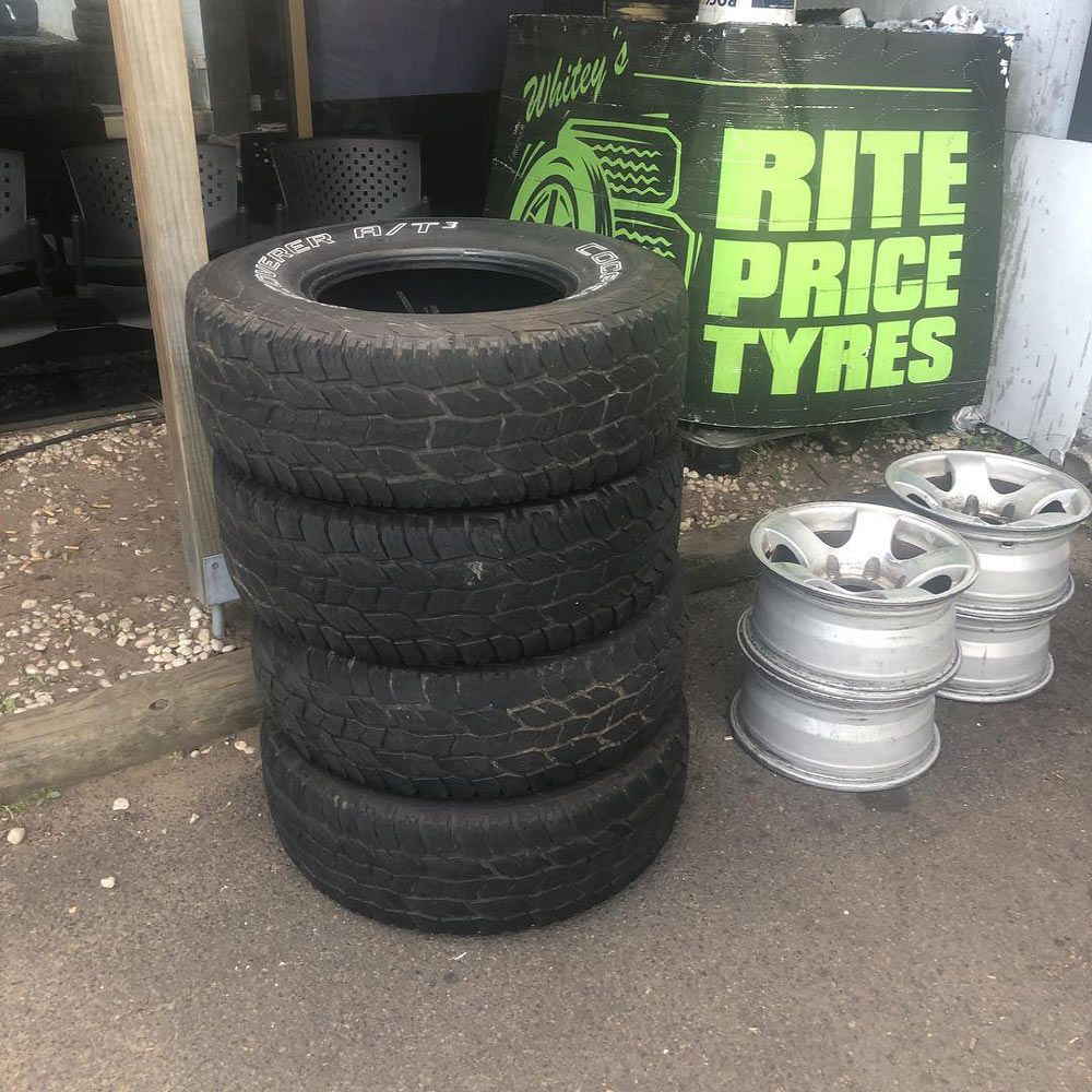 Secondhand Tyres Outside a Store