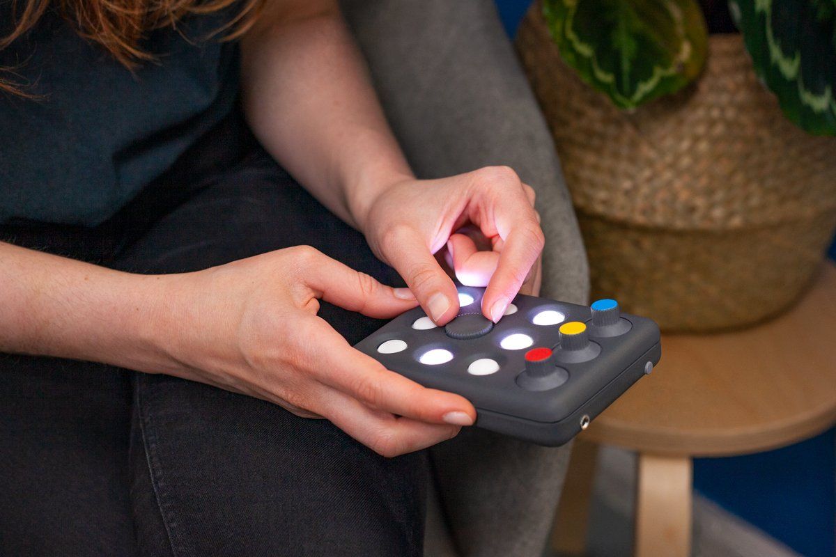 an engineer is testing a game remote control