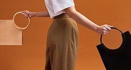 A model holding a fashionable beg handle which is 3d printed