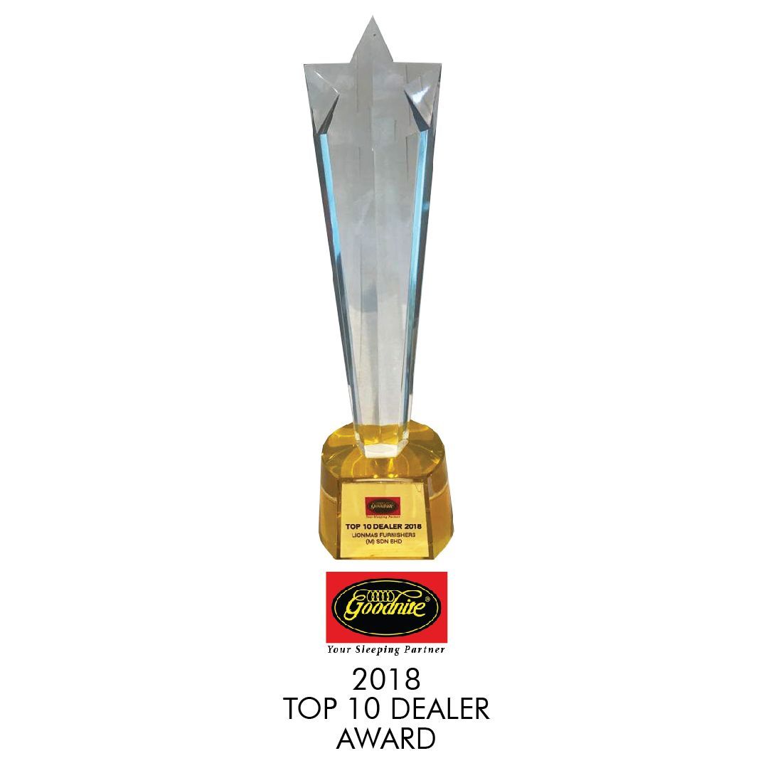 A trophy with a star on top of it that says `` top 10 dealer award ''.