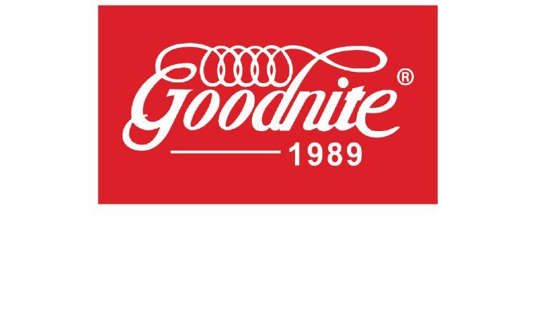 A red and white logo for goodnite 1989 on a white background.