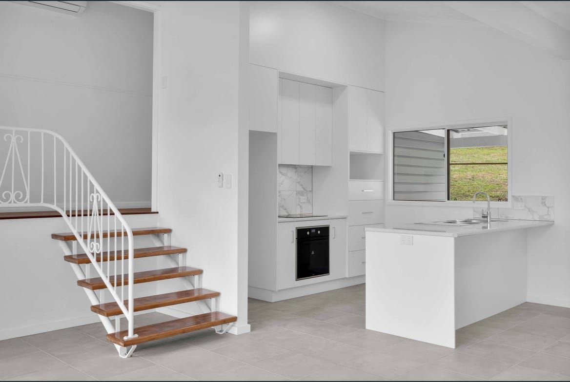 Modern Bathroom With Dual Sinks, Shower, and a Towel Warmer — Morrison Cabinetry in Cedar Pocket, QLD