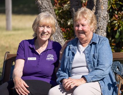 Image of  a resident and care worker at K-Life In-Home care