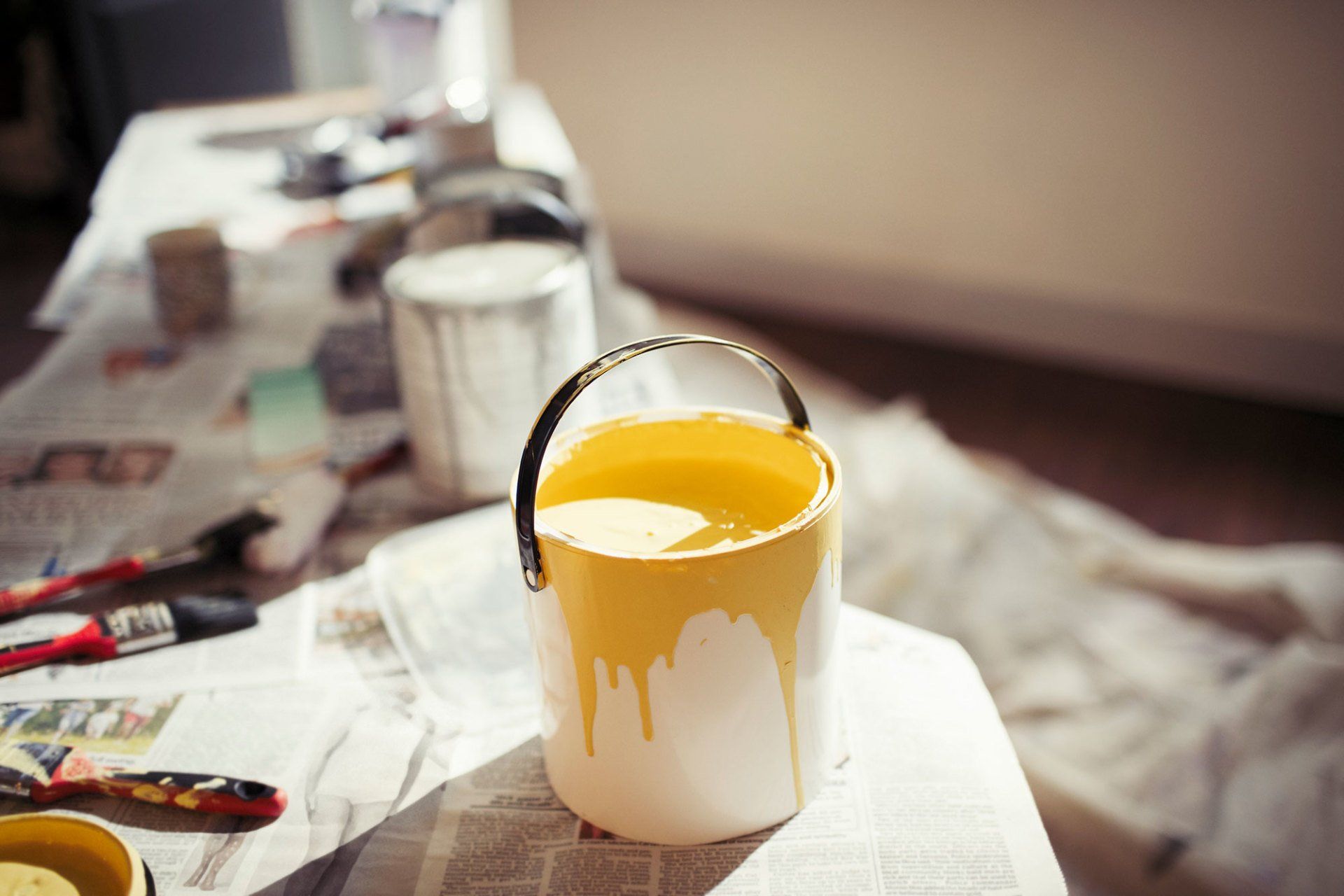 Yellow paint in paint can