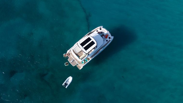 Guests enjoying views aboard the Leopard 53 Power Catamaran by Arawak Charters in the Caribbean.