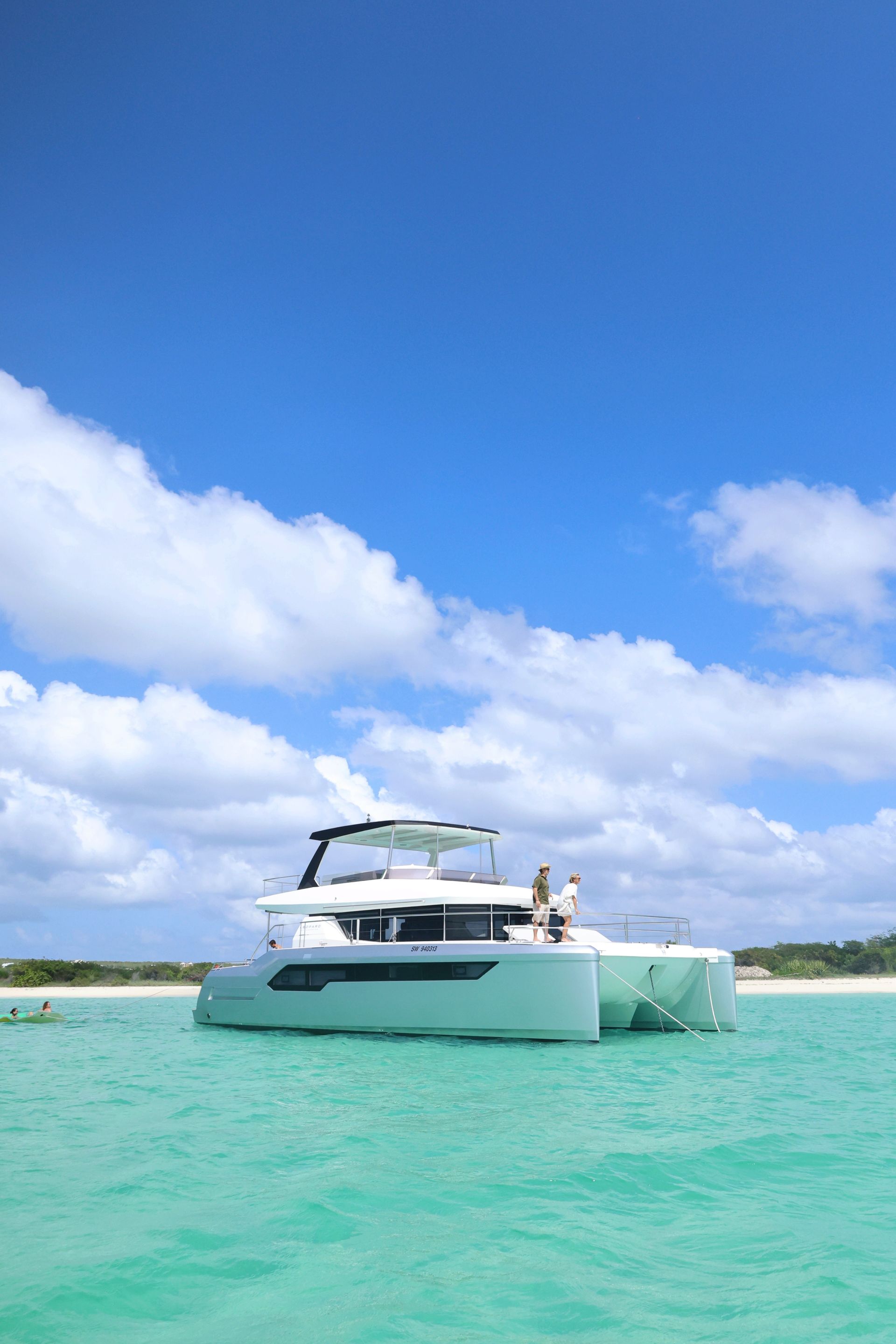 Gests on boat, side view of Arawak Boat charters Leopard 53 feet 2025 edition, elegant and luxurious
