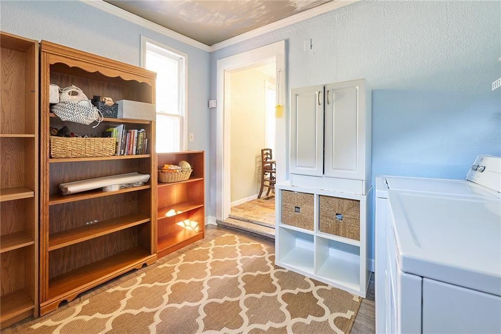 A pantry area with light blue wall paint