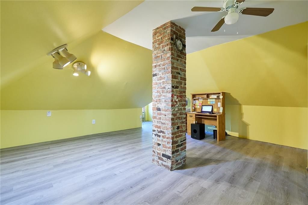 An interior design ceiling with yellow wall
