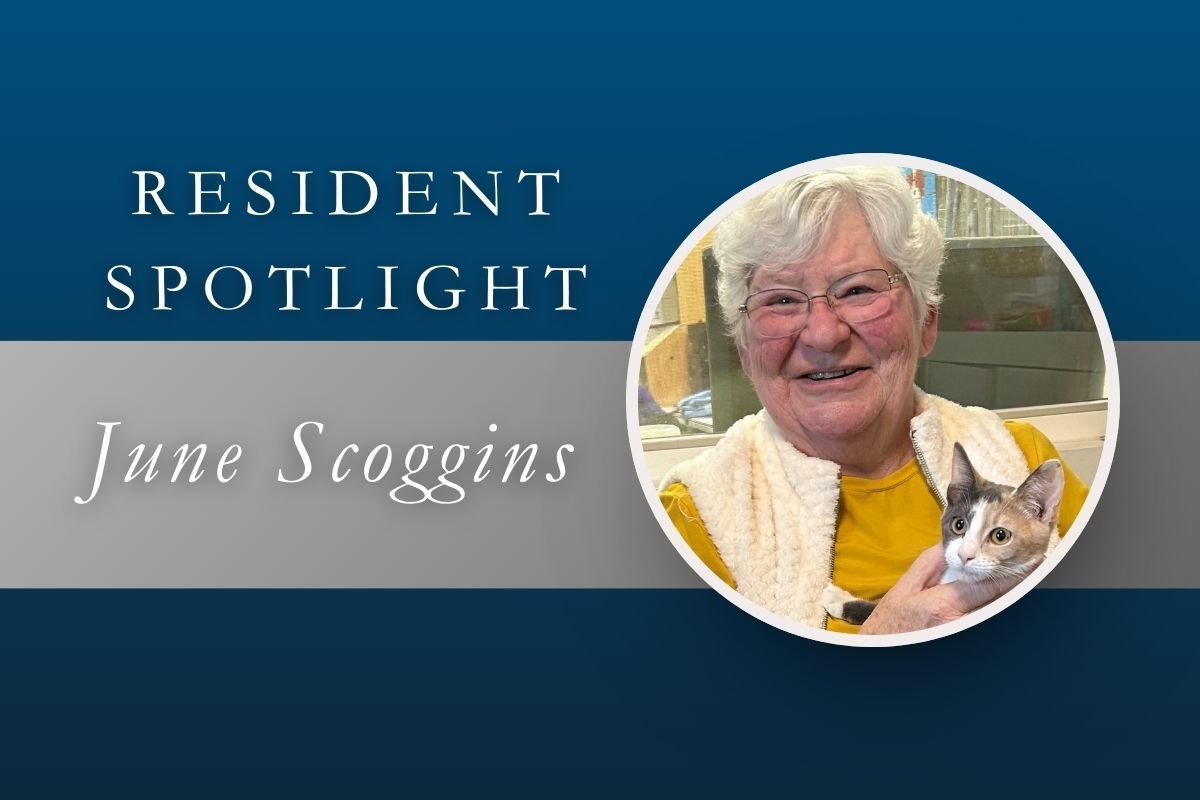 Resident Spotlight graphic for June Scoggins, featuring a woman smiling while holding a small cat.