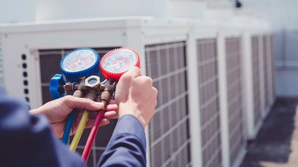 Panel Upgrades — Hand of a Worker in Stevens, WA
