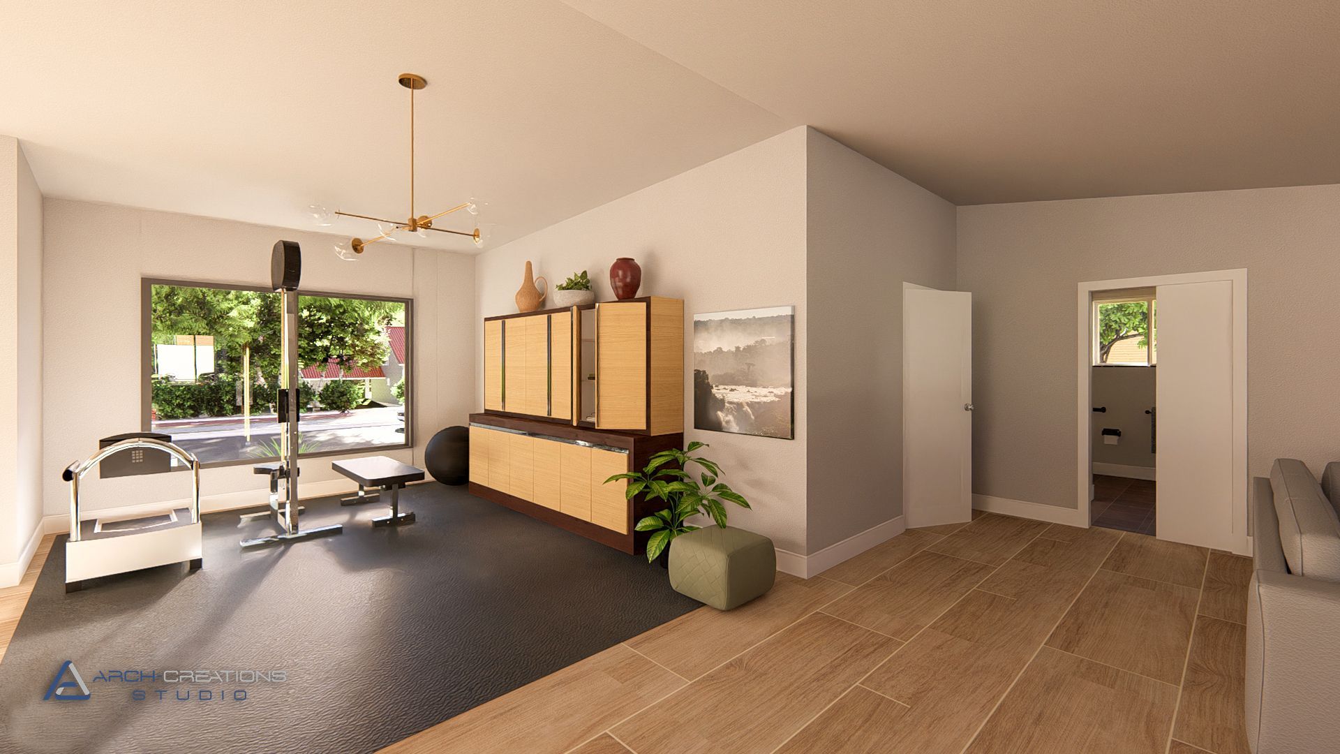 Home gym with weight rack, cabinets, open door to bathroom and a view of a backyard.