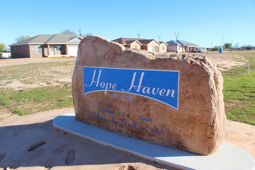 A large rock with hope haven written on it