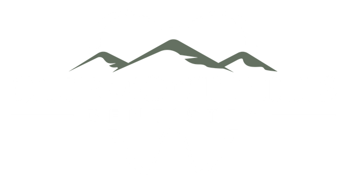 Green mountains against a white background.