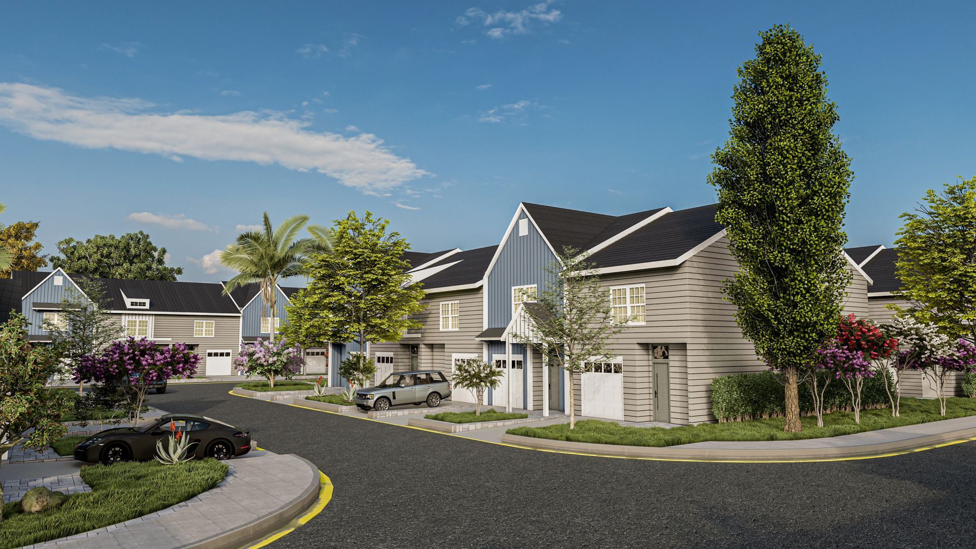 Residential street with two-story houses, gray siding, black roofs, and trees under a blue sky.