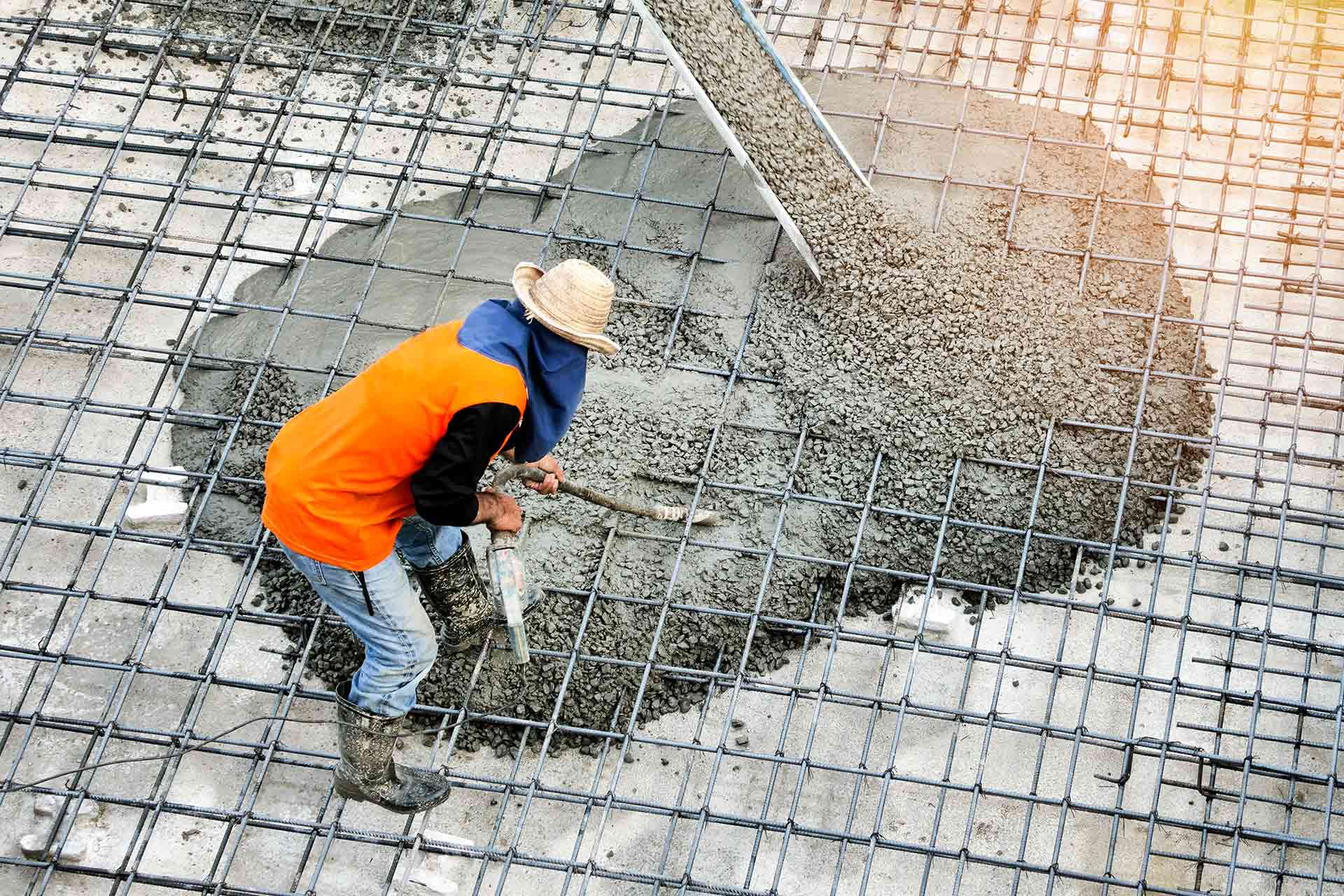 A close up of a concrete floor with a wire mesh.