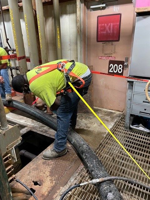 Man working in a Confined Space Rescue operation.