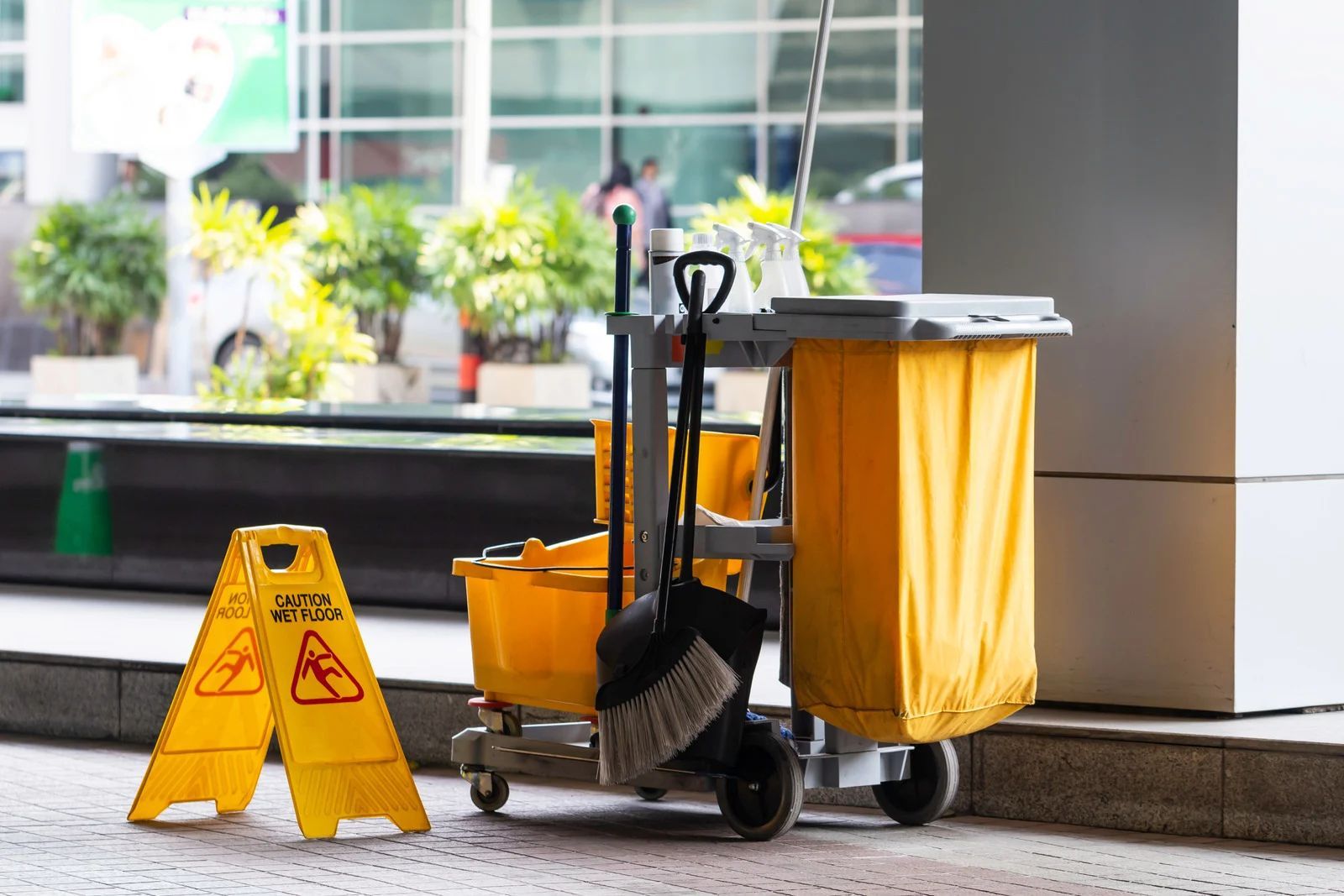 Yellow janitorial cart and