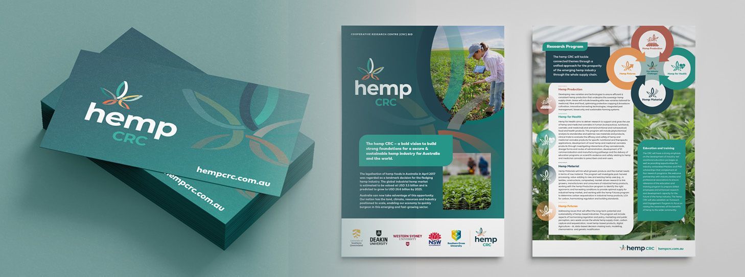 A stack of business cards and a brochure for a company called hemp clinic.