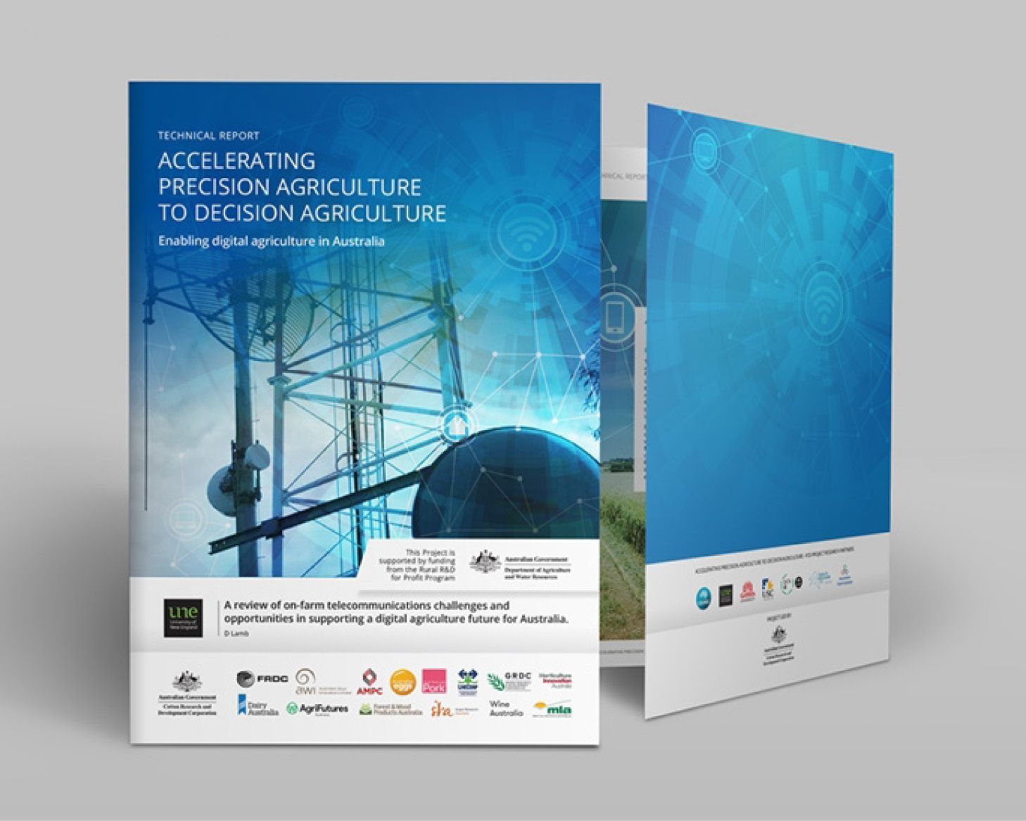 A scientist is holding a small plant in a petri dish