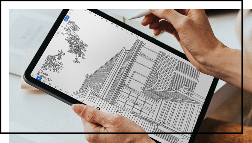 A person is drawing a house on a tablet with a pen.