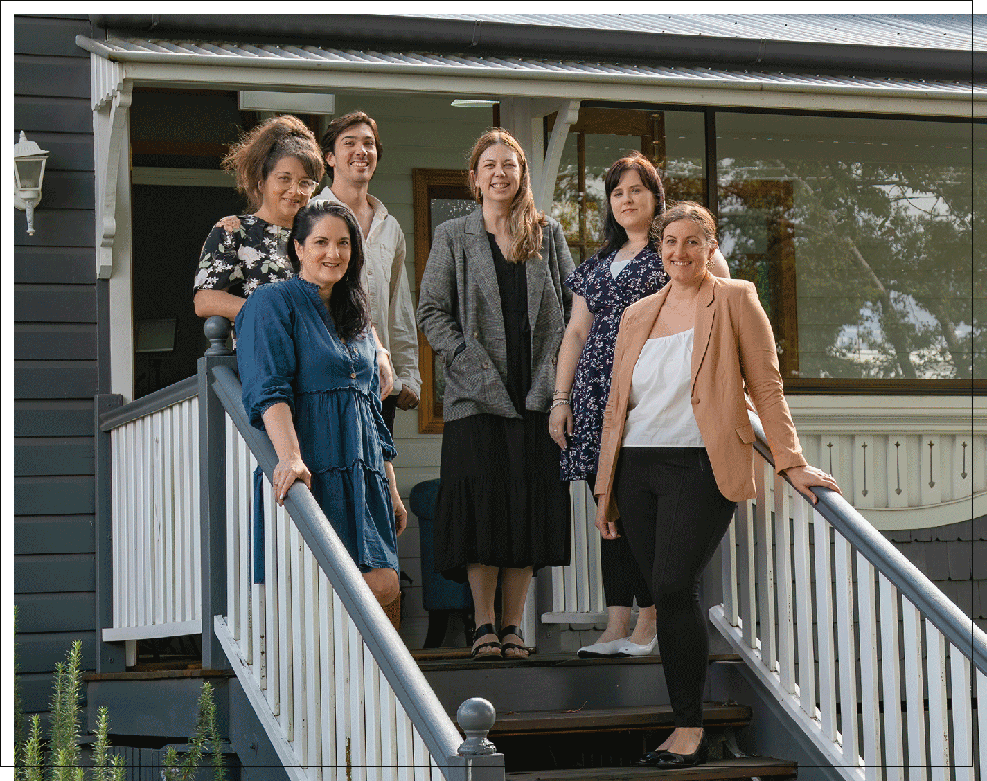 Black Canvas team are standing on the steps 15 Isabel Street Toowoomba