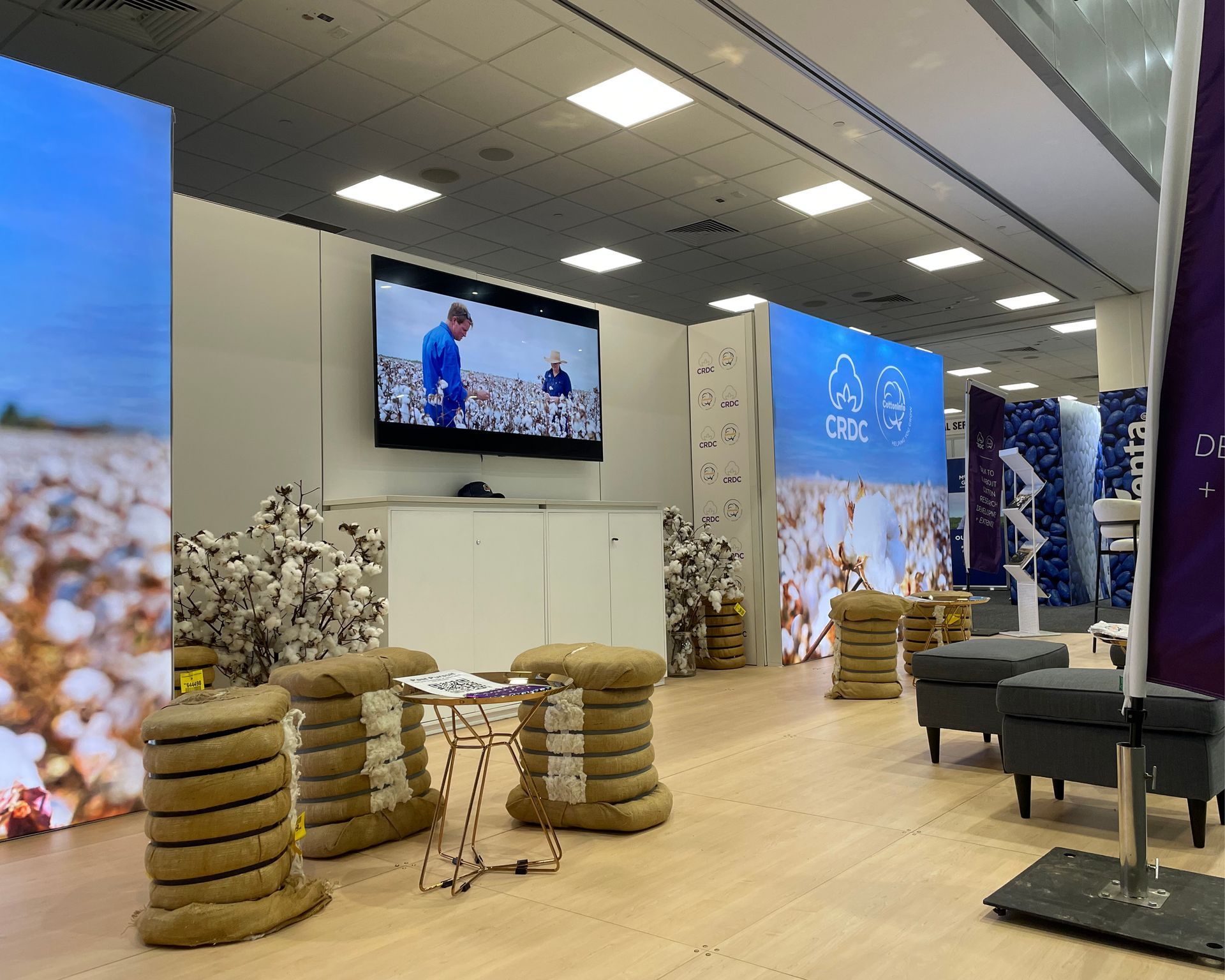 A hat , lanyard , and name tag for cotton info