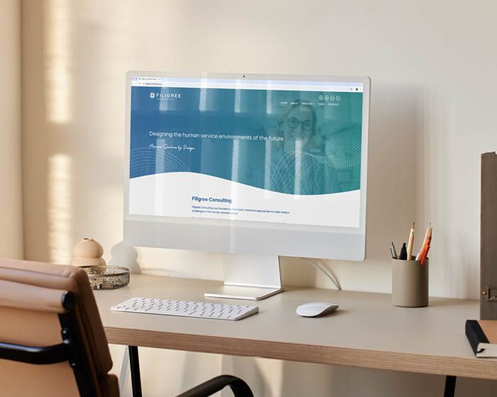 A logo for filigree consulting with a blue background