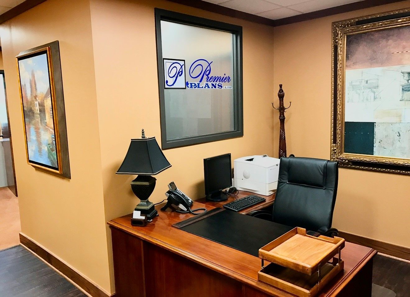 A room with a desk and chair and a sign that says ' attorney ' on it