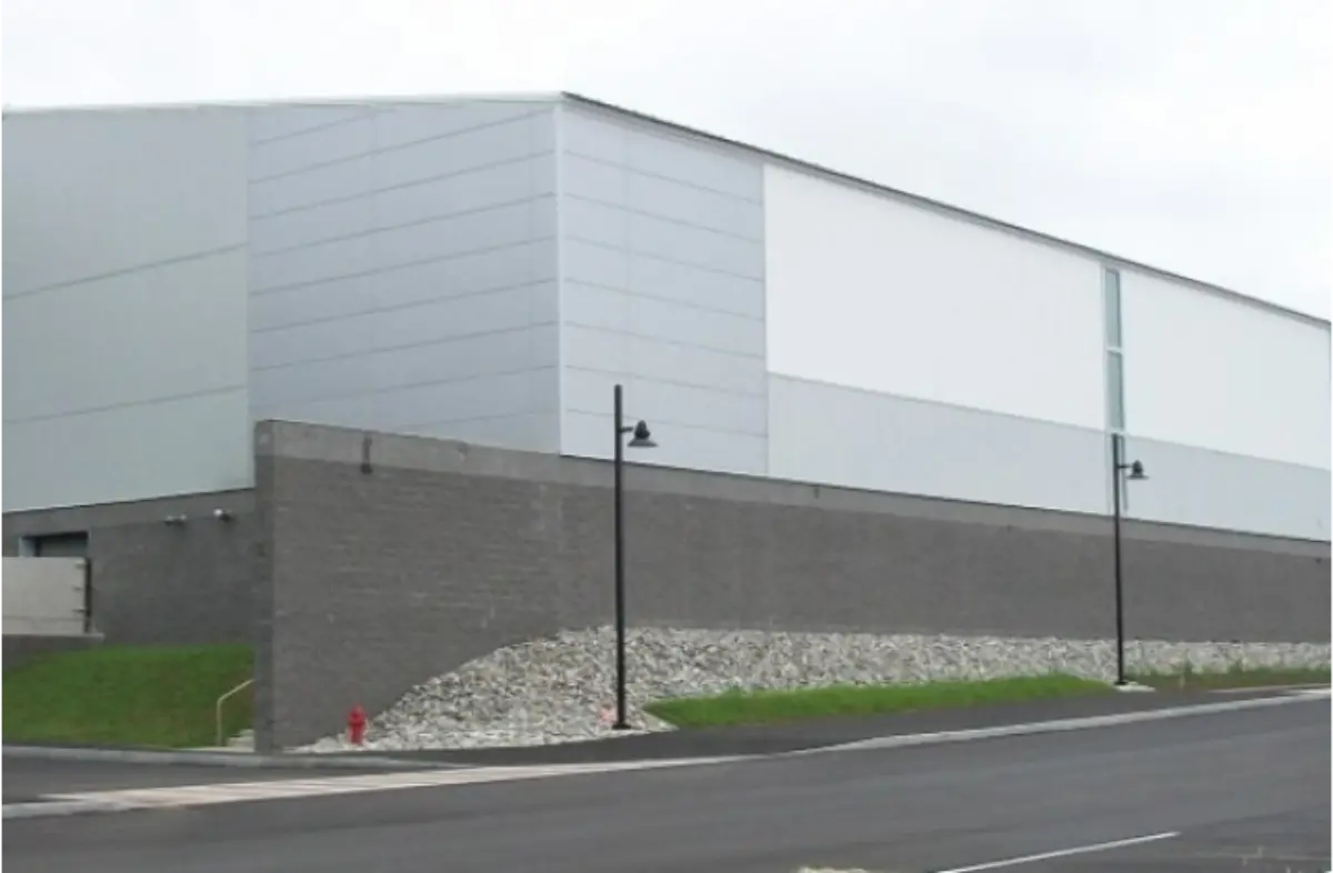 A large building with a fire hydrant in front of it