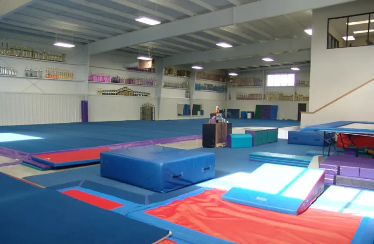 A gym with a podium in the middle of it