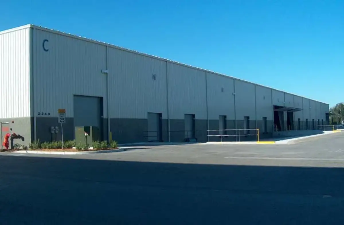 A large building with the letter c on the side of it